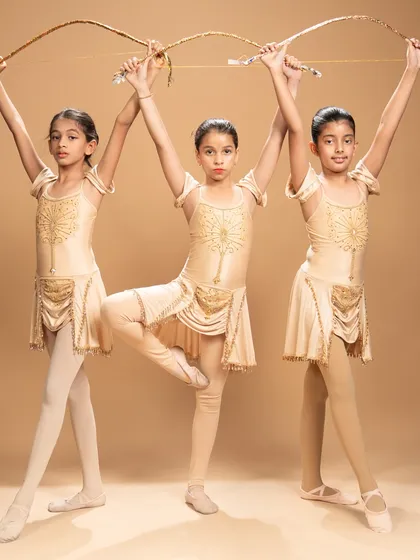 These studio portraits capture the warrior spirit of our dancers performing a piece inspired by the ballet 'Sylvia.' Holding their bows, they embody a story of conflict, courage, and resolution.
