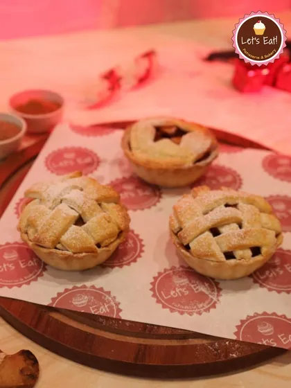 These mini apple pies are a comforting classic on my Christmas menu. Each pie has a buttery, flaky crust with a warm, spiced apple filling, perfect for a cozy festive treat.
