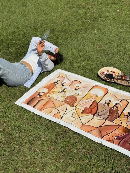 A different perspective of my "Last Supper" painting, laid out on the grass. The sheer size of the 2.5 by 4 ft canvas required me to work on it in various settings, even outdoors.