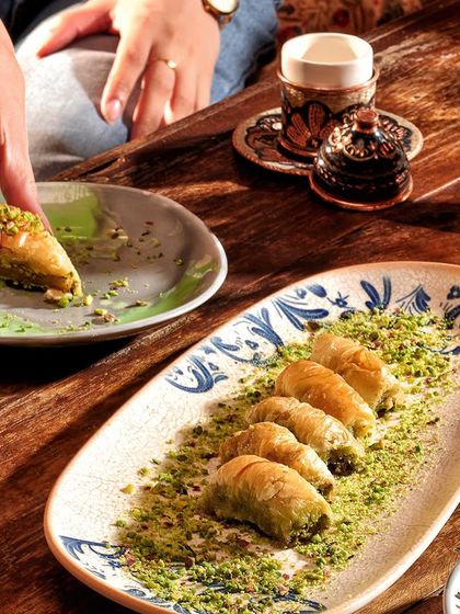 A delicate symphony of flaky layers and sweet honey. Our authentic Turkish Baklava is the perfect accompaniment to an afternoon coffee or a sweet ending to your lunch.