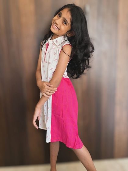 Dressing up our little girls is one of the best parts of motherhood! This adorable cotton dress is all about comfort and cuteness, perfect for their playful energy.