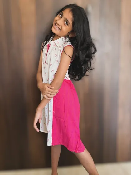 Dressing up our little girls is one of the best parts of motherhood! This adorable cotton dress is all about comfort and cuteness, perfect for their playful energy.