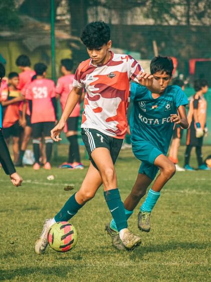 A player weaves through multiple defenders, showing exceptional dribbling ability and composure.