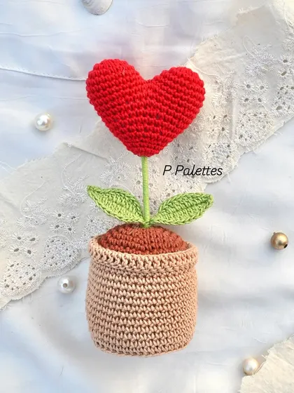 Grow some love with our potted crochet heart. This unique piece is a sweet and constant reminder of affection for your home.