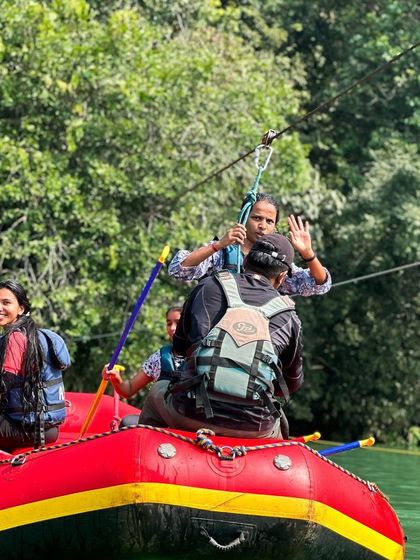 River rafting action in Dandeli! Our trained guides ensure you have a safe and thrilling experience on the rapids.