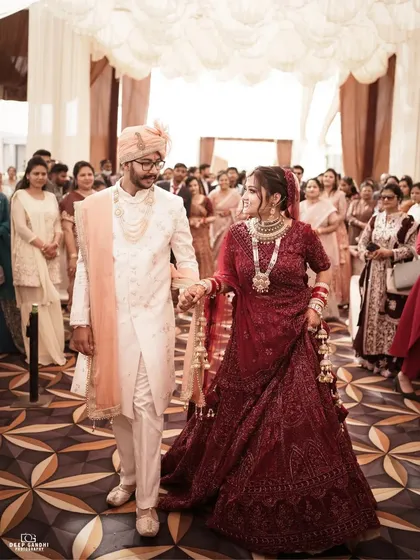 The walk together as husband and wife. We capture this significant moment as the couple makes their way through the aisle, surrounded by their loved ones.