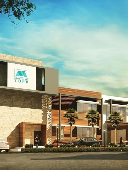 Our design for an administration block for a glass processing plant in Chikodi. The architecture itself reflects the business, using stone cladding, wood textures, and large glass panels to create a strong, contemporary industrial look.