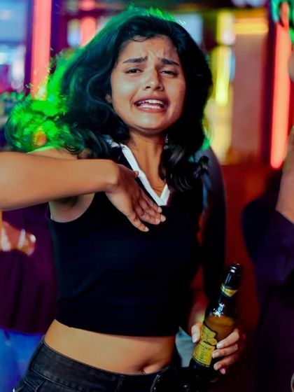 A candid shot of someone lost in the music on the dance floor. This is the ultimate goal.