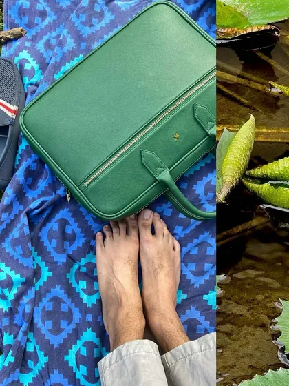 A moment of relaxation from my photo scroll. Bare feet on a picnic blanket with a laptop bag nearby captures the essence of modern work-life balance.