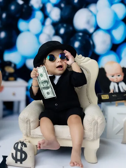 "Who, me?" This little guy is playing it cool in his shades during his "Boss Baby" themed photoshoot.