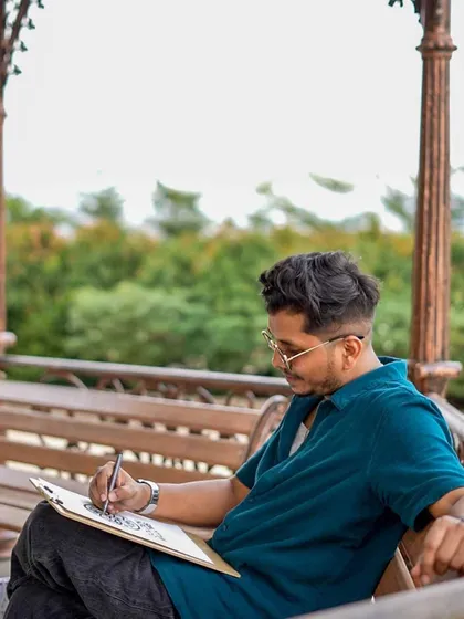 Another shot of me in my element, sketching outdoors. Finding a quiet spot to sit and draw is one of my favorite things to do.