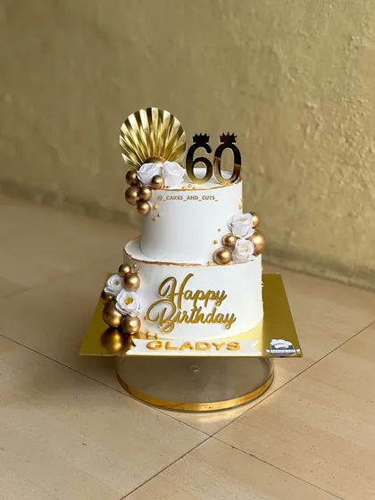 Another angle of the beautiful 60th birthday cake, showing the custom nameplate for Gladys.