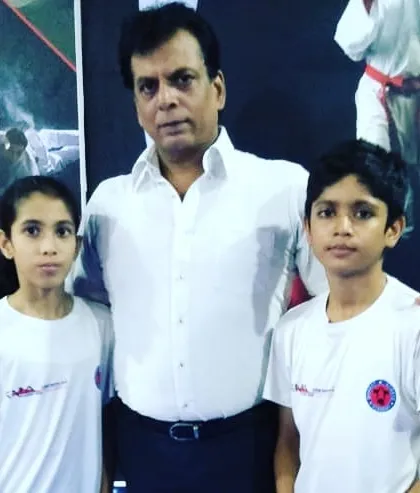 My champions with the esteemed Hanshi Bharat Sharma, a senior figure in the world of karate. It is important for my students to learn from and show respect to the masters of the art.