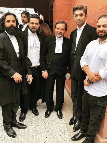 A candid moment with colleagues at the Supreme Court. We support each other in and out of the courtroom.