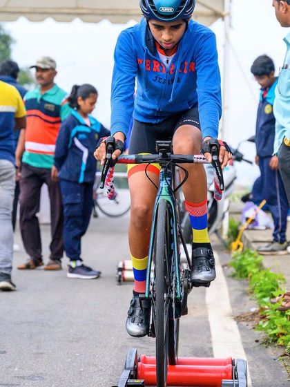 Our U-14 champion warming up on the rollers before his race at the State Championships. Proper preparation is crucial for a top performance.