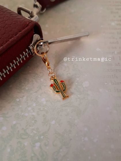 The quirky Christmas cactus charm, a fun and unique alternative for your holiday accessories.