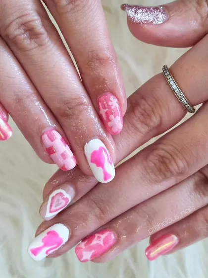The full Barbie set, showing all the different pink designs together. This was done with gel polish on the client's natural nails.