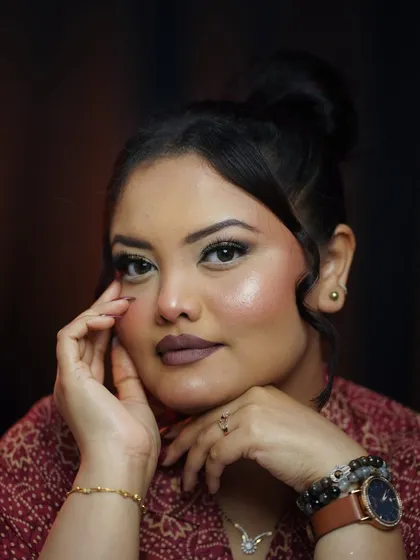 A close-up of the soft glam look, highlighting the glowing skin and defined eyes.