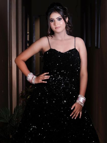 A full length shot of the black sequined gown. I teach my students to create makeup that is elegant and sophisticated enough for the most formal events.