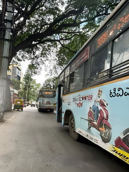 This photo shows the TVS Jupiter ad in transit, demonstrating the real-world visibility of the campaign. Being part of such widespread advertising is a rewarding part of my job.