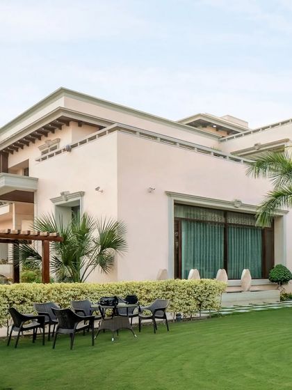 Our finished project unfolds a canvas of sophistication. The fine edges and sharp lines of the building sculpt rectilinear forms, providing the perfect backdrop for lush landscaping details.