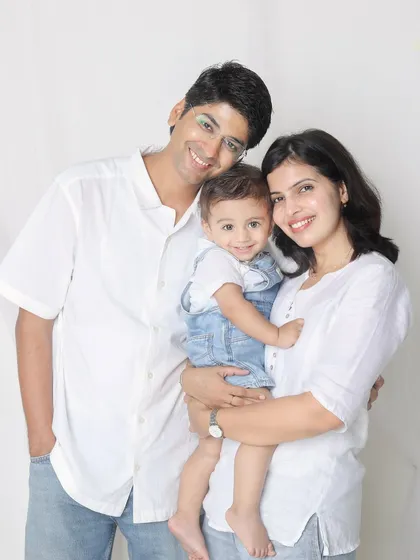 A classic, heartwarming family hug. This pose is simple, timeless, and full of love.