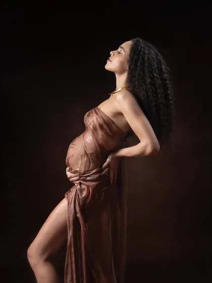 For the bold mama who wants to make a statement. This artistic wet look maternity portrait is about embracing your fierce, unconventional beauty during pregnancy.