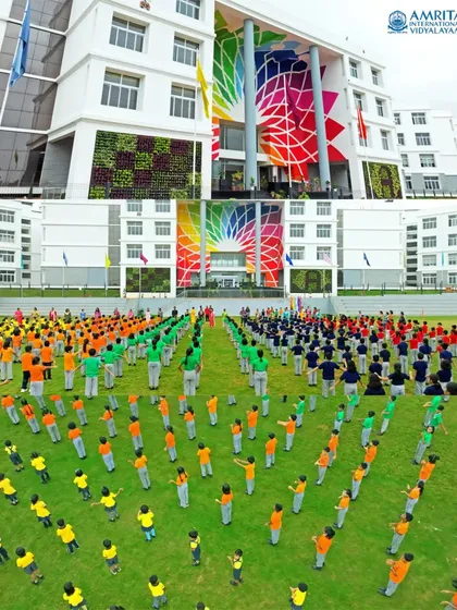 An aerial photograph taken for Amrita International Vidyalayam, capturing hundreds of students in a colorful, coordinated formation on the school grounds. This demonstrates my ability to cover large-scale institutional events and promotional shoots with precision.