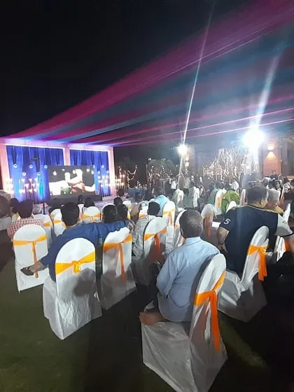 Another view of the outdoor setup at IIT Bombay. You can see the large LED screen, stage, and covered seating arrangement with chair covers, all provided by my team for their multi day event.