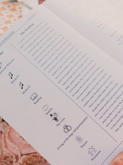For this Catholic wedding, we created a beautiful 'Order of Service' booklet with custom icons to guide guests through the ceremony. It's a small detail that adds a lot of thoughtfulness and clarity.