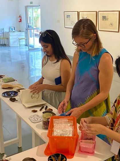 Members of the MAP team interacting with the tactile elements of Mohit Mahato's exhibition.