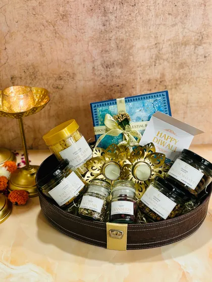 Our 'Regal Affairs' festive basket for Diwali is a perfect blend of healthy treats and festive decor, designed to bring joy and wellness to your celebrations.