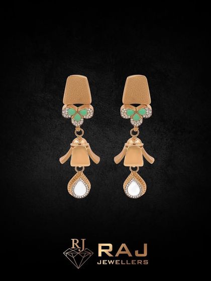 A pair of elegant drop earrings featuring a unique design with green and white stones. The combination of brushed gold and sparkling gems gives them a sophisticated and modern appeal.