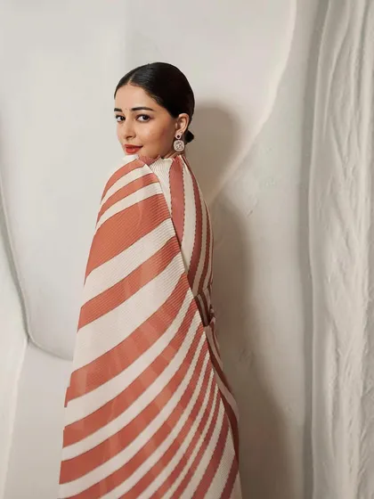 The lovely Ananya Panday wearing my handcrafted micromosaic Cherry Blossom earrings. The design features natural Mozambique rubies from Gemfields and is set in 18k gold.