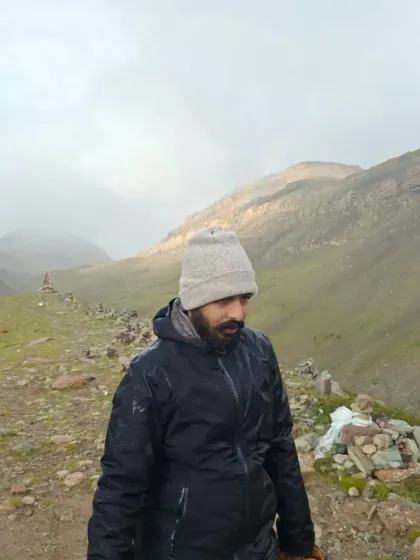Walking the sacred path in quiet contemplation. The weather in the Himalayas is unpredictable, but each condition brings its own unique experience and teaching.