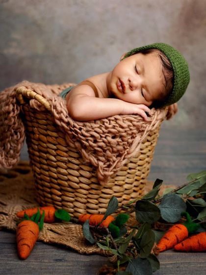 We created a cute little carrot patch theme for this baby boy's portraits. Using props like these felted carrots adds a touch of whimsy to the session.