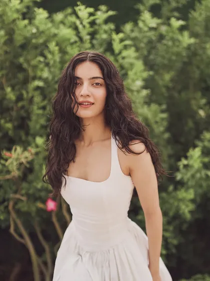 The beautiful Pratibha Ranta in a simple white sundress. This look is all about natural beauty and effortless style, perfect for a summer event.