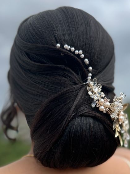 Dakshayini - Hairstyling Academy & Workshops Elegant Buns & Updos photo 19