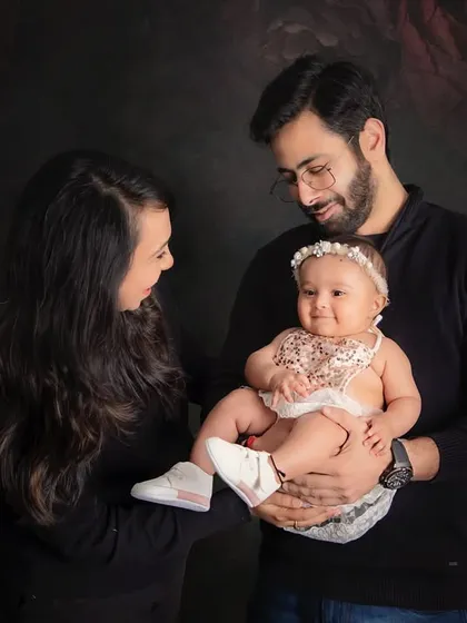The way parents look at their new baby is pure magic. I love capturing these adoring gazes during our family portrait sessions.