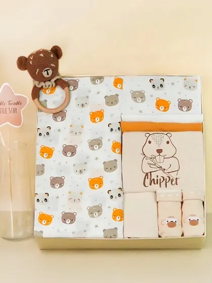 A 'Chipper' themed baby gift box. The cute graphics and coordinated colors make this a very marketable and visually appealing product shot.