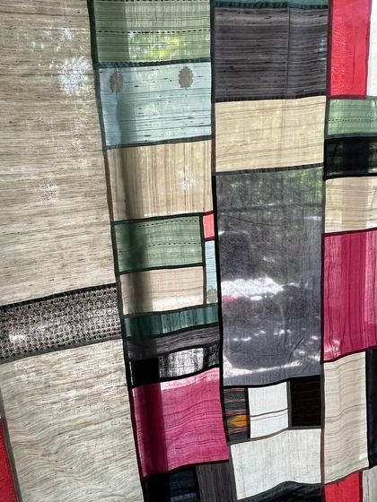 A detail of the Pojagi curtain, focusing on the see-through effect created by the delicate fabrics.