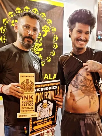 Here is the award-winning healed tattoo, a large piece on the client's torso. Healed tattoos are the true test of quality, showing how the ink has settled into the skin over time.