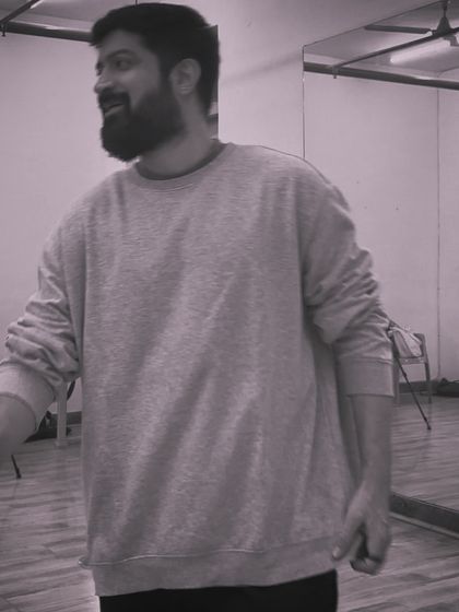 A candid black and white shot from a class, capturing the raw emotion of the moment.