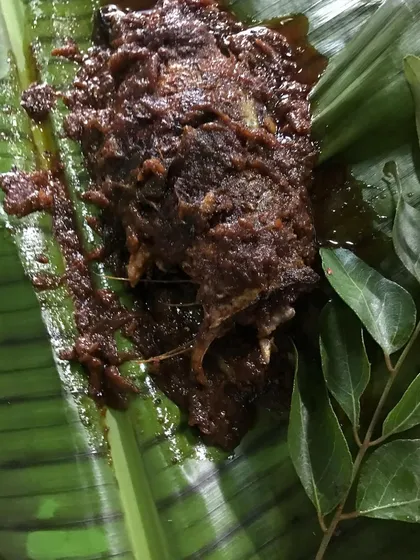 The final result of our Pollichathu after being cooked in the banana leaf. The fish is incredibly tender, and the masala has deepened in colour and flavour.