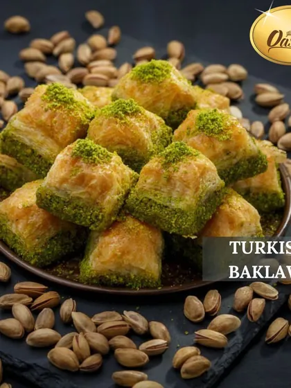 A platter of my Turkish Pistachio Baklava, surrounded by the high-quality pistachios I use. The vibrant green of the nuts against the golden pastry is a feast for the eyes.