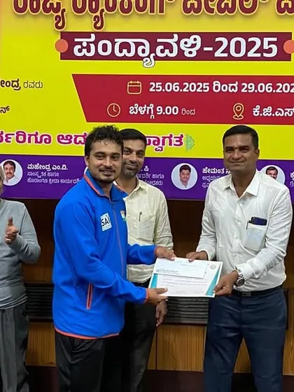 Our coaching staff is comprised of proven winners. Here, our panel coach Akshay Mahanta receives his award for finishing 3rd in the Men's Singles at the Karnataka State Ranking Tournament.