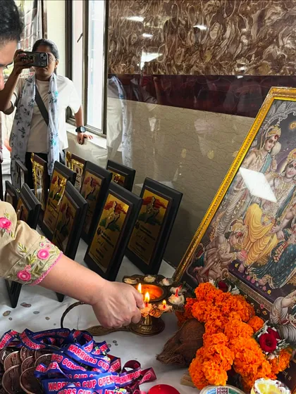 We always start our events with a prayer and by lighting a diya for blessings. This moment captures the traditional lamp lighting ceremony before the start of the Warriors Cup.