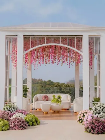 Crafting an intimate 'Lagan Lakhwanu' ceremony for Radhika and Anant was about creating a space that felt both grand and deeply personal. This glasshouse, nestled in lush greenery with a stunning floral pool installation, reflects my approach to designing serene, spiritual, and breathtakingly beautiful environments for high-profile celebrations.
