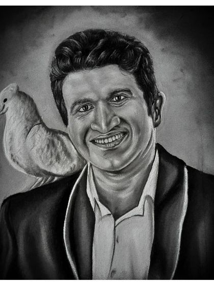 The final artwork of 'Karnataka Ratna' Puneeth Rajkumar, a tribute to a legend. The text and the dove were added to complete the piece, showing how I can incorporate symbolic elements into a charcoal portrait.