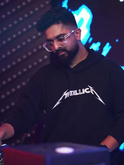 Smiles on repeat. A candid shot of me enjoying the vibe while mixing.